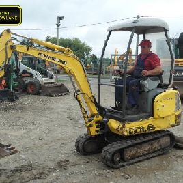 NEW HOLLAND E18 MINIKOPARKA (# 905)