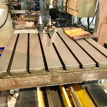 4"Kuraki#KBT1003W, 41 x 47 built-in rotary table,#50 taper,built-in outriggers,1981 (2 available)