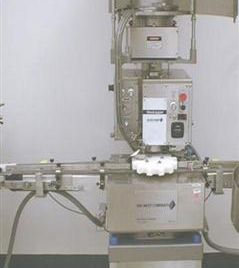 Genesis West#NPW-575, capper,up to 120 vials/min.,3 spindle crimping mechanism,star wheel index w/feed & discharge conveyor,#38707