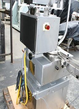 Genesis West#NPW-575, capper,up to 120 vials/min.,3 spindle crimping mechanism,star wheel index w/feed & discharge conveyor,#38707