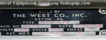 Genesis West#NPW-575, capper,up to 120 vials/min.,3 spindle crimping mechanism,star wheel index w/feed & discharge conveyor,#38707
