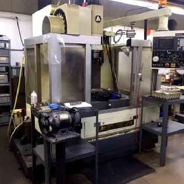 Kitamura#MYCENTER-2X, CNC VMC,20" X,14 Y,16 Z,7000 RPM,Cat 40,20 ATC,Fanuc OM,14 x 31 table,10 tool holders,1991