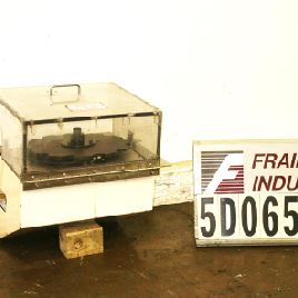 Iwka/ Oystar #CP220, automatic starwheel bottle loader capable of speeds of over 200 cartons per minute