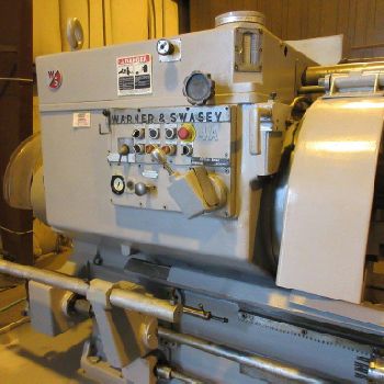 No. 4AWarner & Swasey, turret lathe, 12" hole, 75 HP, tracer, bar feeder, 1976
