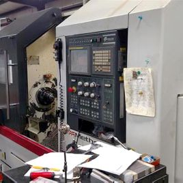 Feeler#HT-30SY, CNC lathe,36" sw,12 chuck,3 bar,6000 RPM,28 turn length,Fanuc 18iTB,2011