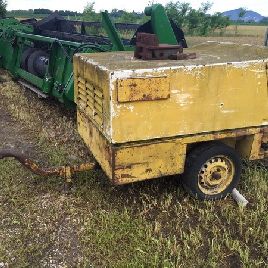 Air compressor for pneumatic hammer