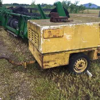 Air compressor for pneumatic hammer