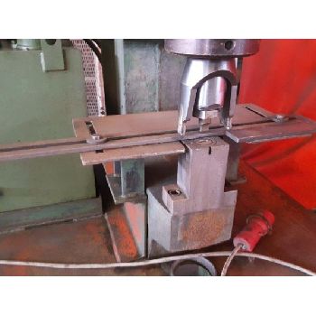 Hydraulic IMAC punching machine with accessories cabinet
