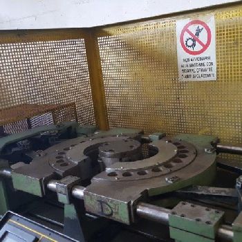 Belling machine for flues