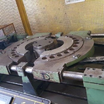 Belling machine for flues