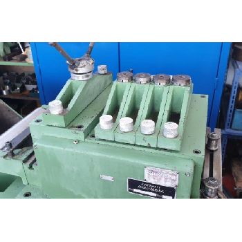 Reel with straightener