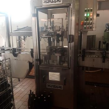 Used NORTAN capping machine mod. UNICAP 35 - 2005