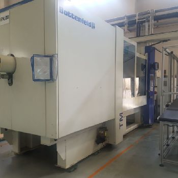 Battenfeld TM 650/4500 Injection moulding machine + conveyor