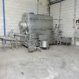 Máquina de producción, envasado y porcionado de queso APV HCT-1A.