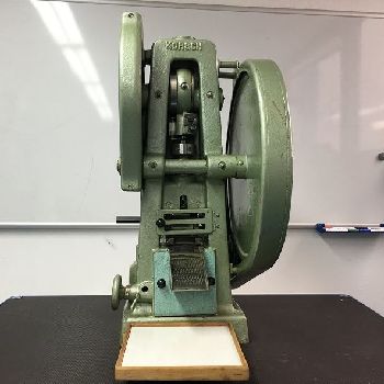Used Korsch EK0 Single punch tablet press eccentric