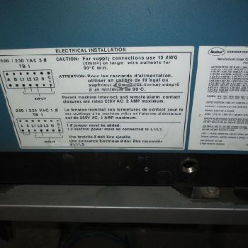 NORDSON 3400 sticker on stainless steel platform