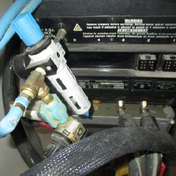 NORDSON 3400 sticker on stainless steel platform