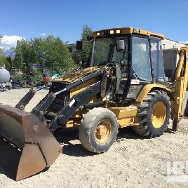 2000 Cat 428C Retroexcavadora