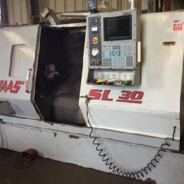 SL30T HAAS,W/ HAAS 300 BARFEEDER,MFG:2003 Our stock number: 10252