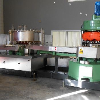 Vacuum dosage and seaming group Comaco