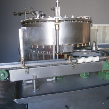 Vacuum dosage and seaming group Comaco