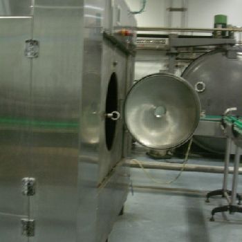 Mobemur automatic can seamer with vacuum.