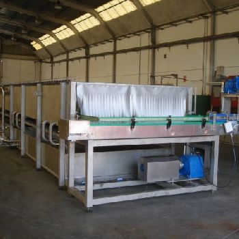 Cooler pasteurizer for cans