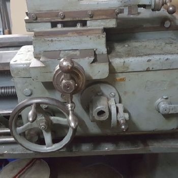 Cock and piston lathe