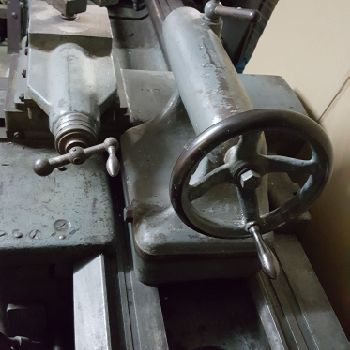 Cock and piston lathe