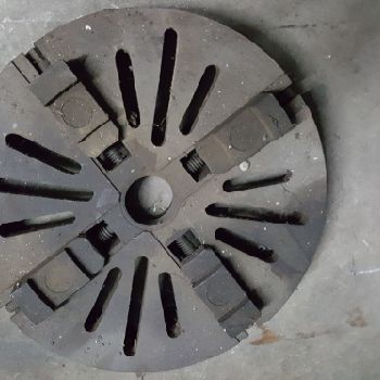 Cock and piston lathe