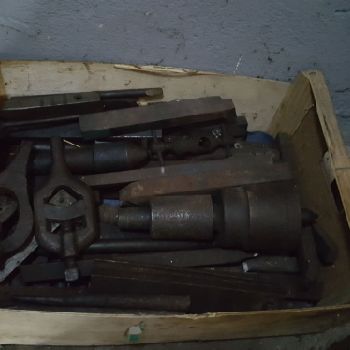 Cock and piston lathe