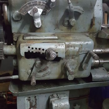 Cock and piston lathe