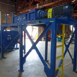 (1994) 100 HP SSI M85 Dual-Shear Shredder /Hydraulic Ram Hopper/Stand