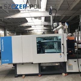 KRAUSS MAFFEI KM 230-750 AX con robot Wittmann-Krauss Maffei LRX100 / Máquina eléctrica