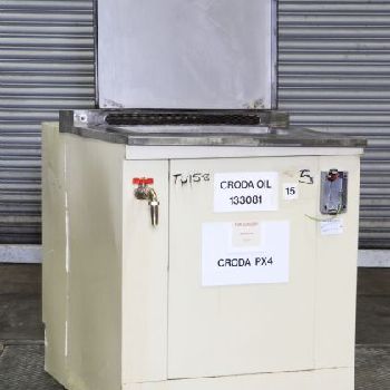 A Stainless Steel Chambered Spray And Drain Tank.