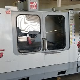 Haas # VF-5, 50 "X, 26 Y, 25 Z, 4to eje listo, 16 Meg, Macros, grifo rígido, 2000