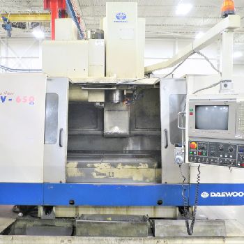 Daewoo #DMV-650, 3-Axis CNC VMC, 50" X,25.6 Y,22 Z, 6000 RPM, 30 ATC, Cat 50, #50 taper, Mitsubishi 520 CNC, CTS, 1997