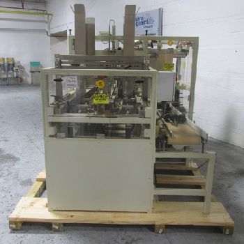 Schroeder#2600, case packer, up to 12 cases/minute, glue seal with Nordson glue pot, serial# 5599, #3109-7