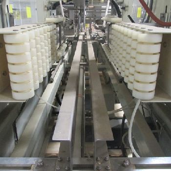 Schroeder#2600, case packer, up to 12 cases/minute, glue seal with Nordson glue pot, serial# 5599, #3109-7