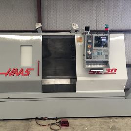 Haas#SL-30T, 30" swing over bed,40 centers,3 spindle bore,12 tool turret,2001