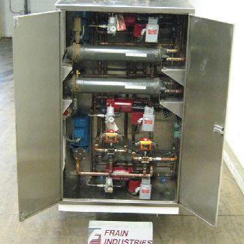 Aasted#AMT1000, 7 plate, chocolate tempering system capable of doing 1000 kg, or 2200 lbs per hour