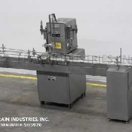 Filamatic#DAB-16, 2 head inline piston filler, 12-60 bottles/minute, 60-520ml, star wheel indexing