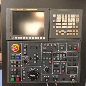 33.5" Doosan #VT900, 39.4 sw,32 chuck,3-jaw, 12 turret, Fanuc I, 2-speed gearbox, 2013