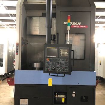 33.5" Doosan #VT900, 39.4 sw,32 chuck,3-jaw, 12 turret, Fanuc I, 2-speed gearbox, 2013