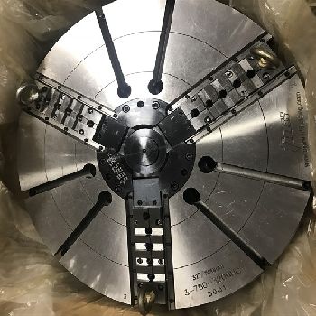 33.5" Doosan #VT900, 39.4 sw,32 chuck,3-jaw, 12 turret, Fanuc I, 2-speed gearbox, 2013