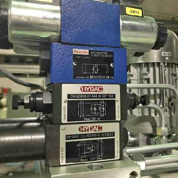 2000 lb.Arkudouble end uncoiler,24" wide (each side),18 -21 ID,hyd link type exp,2000â€™s