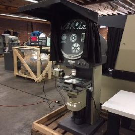 20"Nikon#V-20A, 18 x 10 table,7 x3 travels,Quadra-Chek Comp. DRO,10x,20x lens,1990