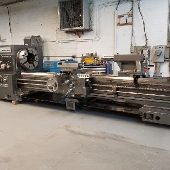 32" x 118Kuraki#LC-12/30, hollow spindle lathe,(2) 4-jaw 24 chucks,in/mm,refurb.’18
