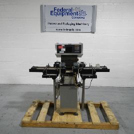 Garvens#SL2PM, 4" W x 11 L scale,1100 gram cap,digital controls,powered.side grip.belt feed/discharge,serial #7223,1998,#40570