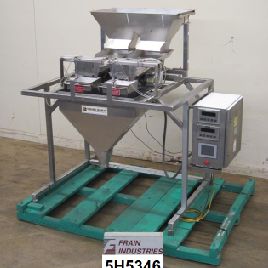 1/4 oz. to 2.5 lbs.Weigh RiteTwin Lane #PMB-802T, linear bulk / dribble scale rated from 0-25 containers per minute